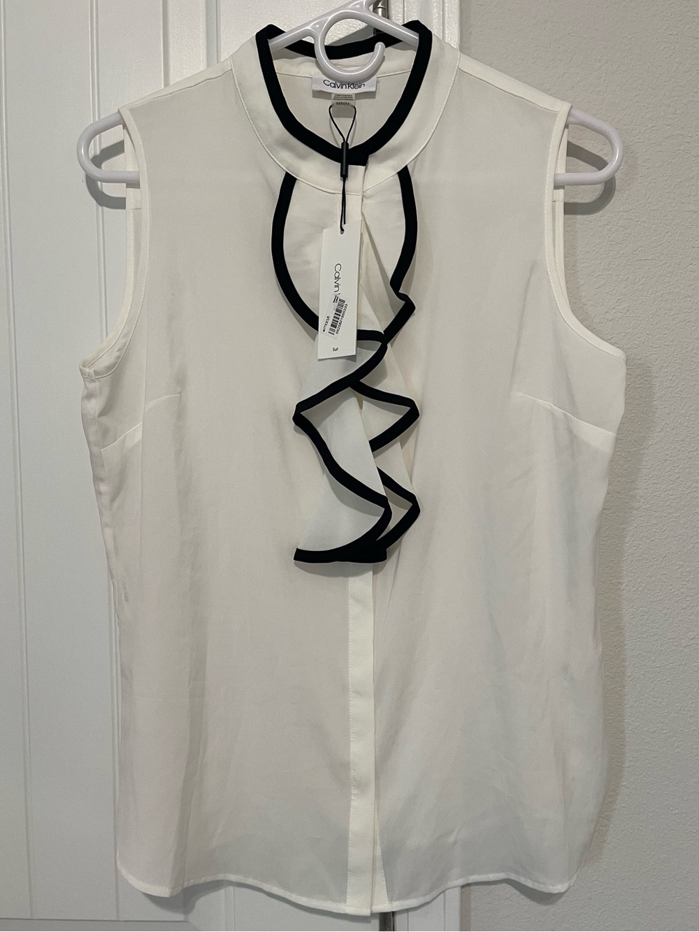 Calvin Klein White Sleeveless Ruffle-Trim Blouse with Black Accents